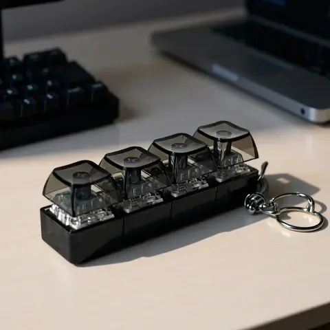 Luzes LED para chaveiro para aliviar o estresse e a ansiedade, brinquedos de teclado para chaveiro, acessórios portáteis para mesa de escritório, presentes para escritório.