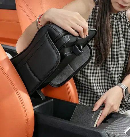 Novo apoio de braço universal para carro, com almofada de espuma de memória e bolso para guardar objetos, proporcionando conforto ao condutor e servindo como acessório para o interior do veículo.